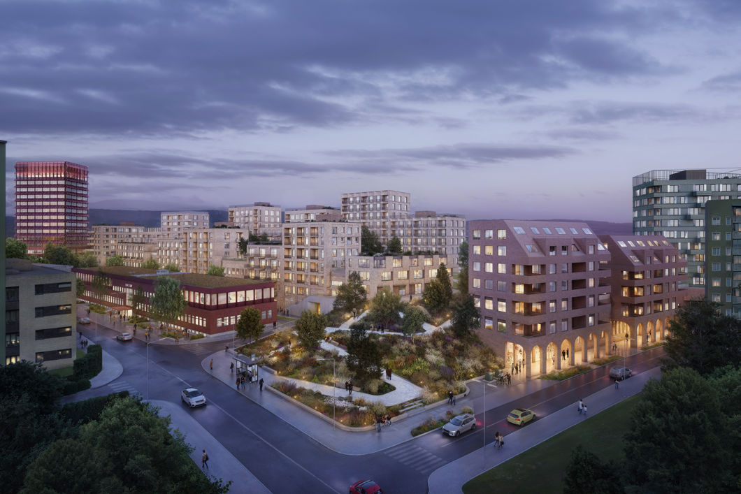 En arktitektskisse av en ny byddel. Det er biler på veien inn til et veikryss foran bygninger i skumringen.