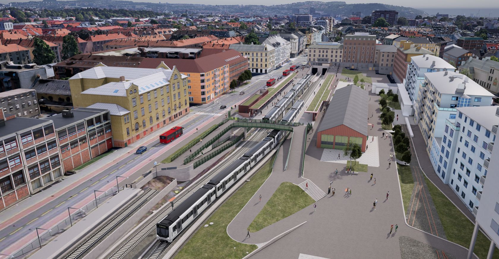 Bildet viser hvordan Majorstuen stasjon vil se ut i fremtiden, med en åpen plass opp mot ny gangbru over sporene til Politihøyskolen.